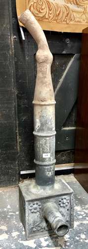 An antique lead rainwater hopper