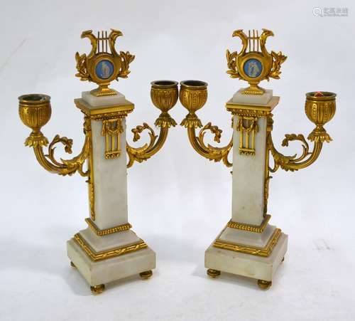 A fine pair of 19th century French Louis XVI style ormolu candelabra