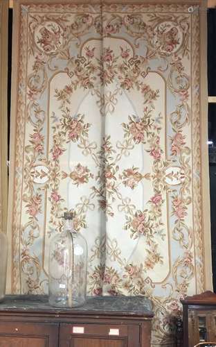 A traditional Aubusson needlepoint carpet