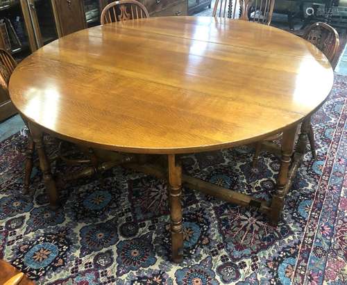 Titchmarsh & Goodwin, a good quality 18th century style golden oak dining table