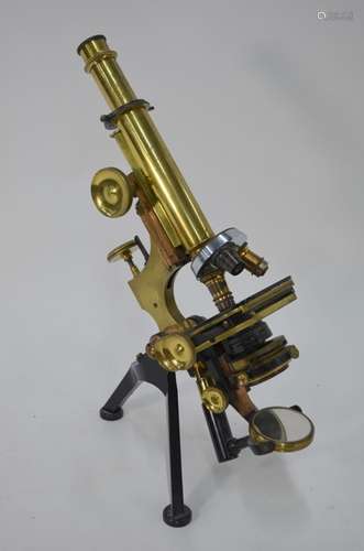 A brass and lacquered compound microscope