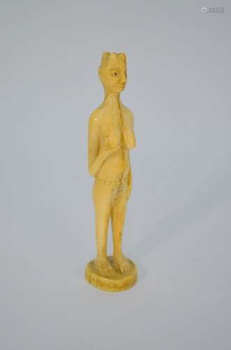 A 19th century African carved ivory figure