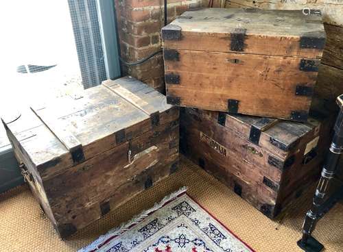 A pair of 1930's steel bound pine travel trunks