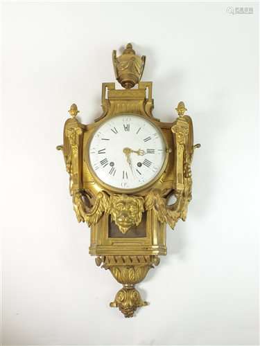 A Louis XVI ormolu striking cartel clock