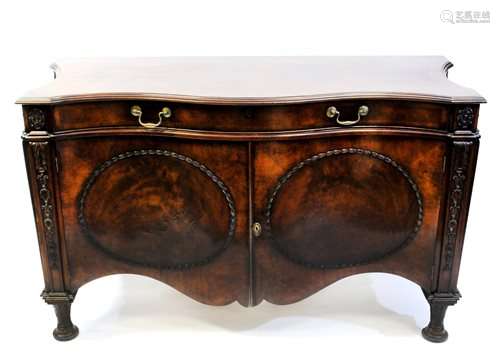 A pair of George III style crossbanded mahogany commodes