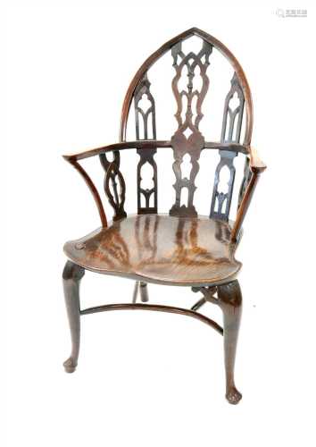 An unusual 18th century vernacular gothic Windsor armchair