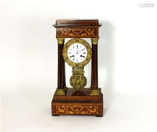 A French rosewood and inlaid portico clock