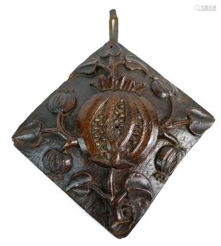 An early 16th century Tudor English carved oak ceiling boss