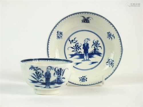 A Caughley 'Waiting Chinaman' tea bowl and saucer