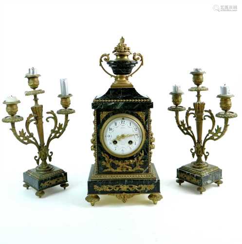 A 19th century French marble and gilt cast metal clock garniture