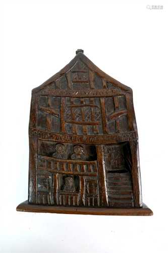 A 17th century carved vernacular oak panel portraying God's Providence House, Chester