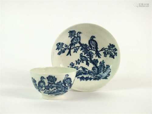 A Caughley Birds in Branches tea bowl and saucer