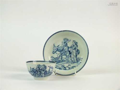 A Liverpool porcelain 'Travellers' tea bowl and saucer
