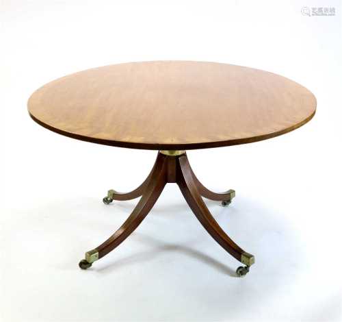 A large Edwardian cross-banded mahogany breakfast table