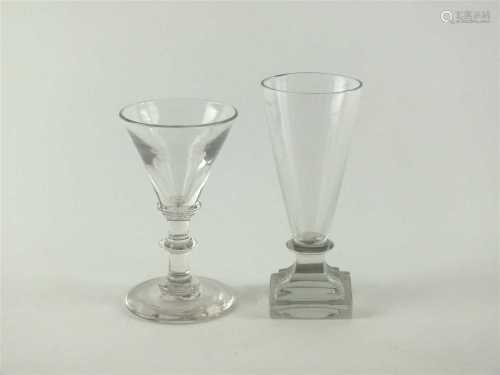 An unusual 18th century dwarf ale firing glass and a 19th century wine glass