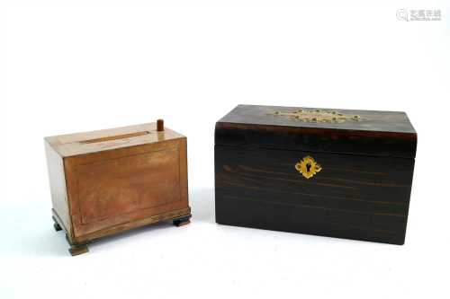 A Victorian coromandel veneered tea caddy and an early 20th century cigarette dispenser