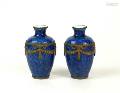 A pair of Sèvres Paul Milet bronze-mounted vases