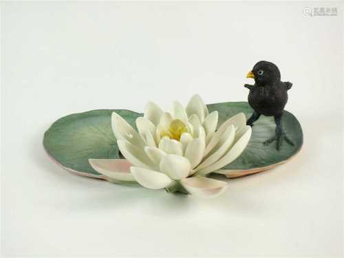 A Royal Worcester model of a Moorhen Chick and a Water Lily