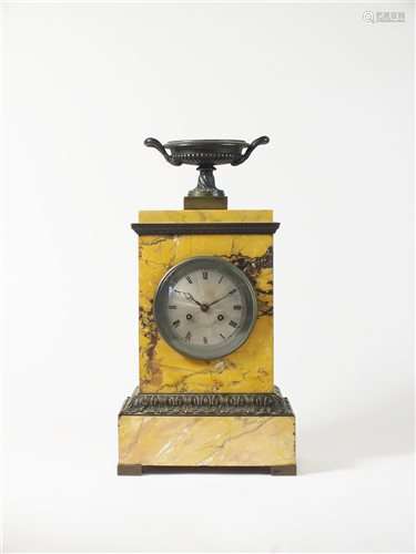 A French neoclassical Sienna marble and bronze mantel clock