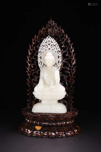 A HETIAN JADE 'SHIJIAMONI' BUDDHA