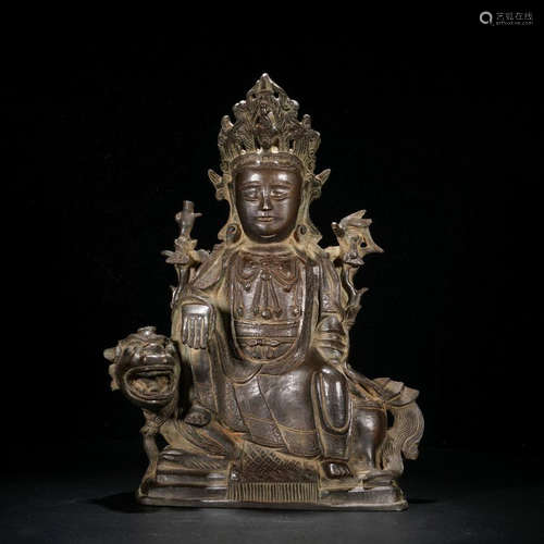 A BRONZE 'QISHIGUANYIN'ORNAMENT