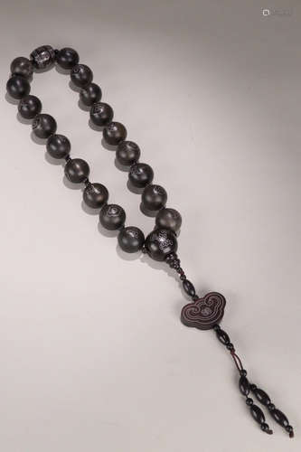 A CHENXIANG WOOD EIGHTEEN BEADS ROSARY