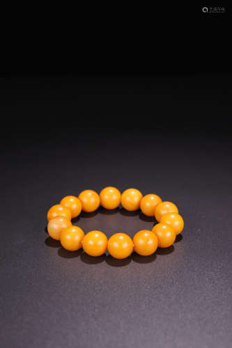 A YELLOW AMBER ROSARY