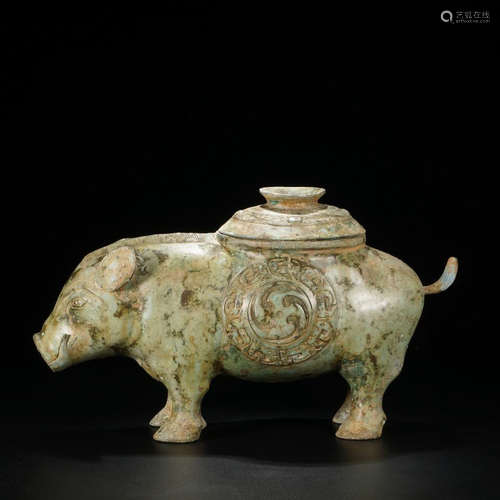 A BRONZE CARVED PIG ORNAMENT