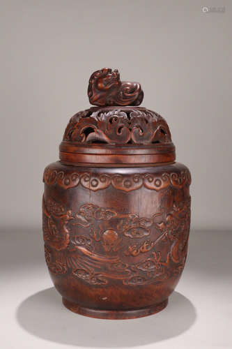 A HUANGHUA WOOD CARVED DRAGON AND PHOENIX BEAST SHAPED BUTTON INCENSE HOLDER