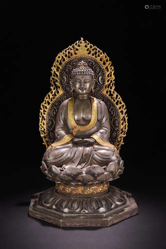 A GILT SILVER 'SHIJIAMONI'FIGURE