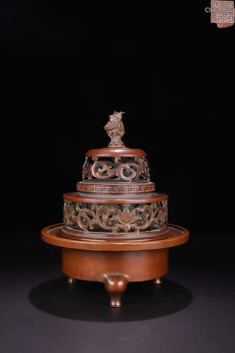 A BRONZE THREE FLOORS INCENSE HOLDER