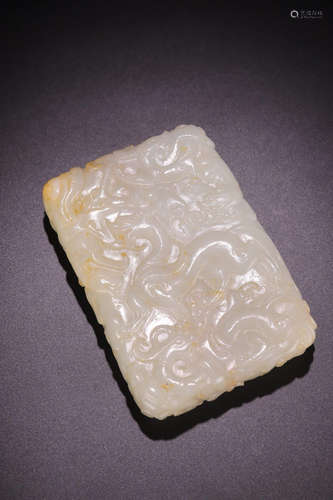 A HETIAN JADE CARVED DRAGON PENDANT