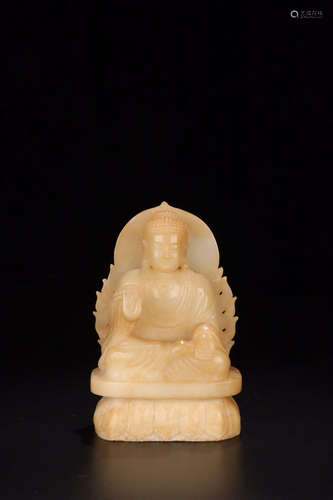 A HETIAN JADE SAYKAMUNNI FIGURE