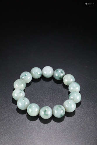 A JADEITE BEADS BRACELET