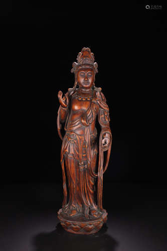 A CHENXIANG WOOD 'ZANGCHUANGUANYIN' FIGURE