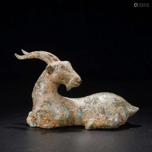 A BRONZE SHEEP SHAPED ORNAMENT