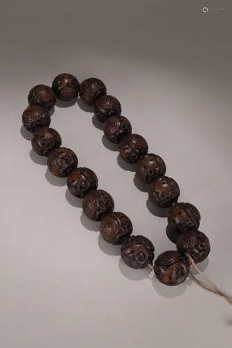 A CHENXIANG WOOD EIGHTEEN BEADS ROSARY