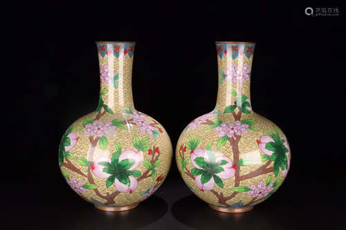 A PAIR OF BRONZE PEACHES PATTERN BOTTLE VASES