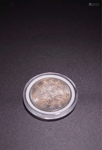 A SILVER 'GUANGXU' MARK COIN