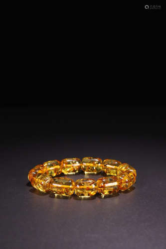 AN AMBER ROSARY