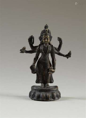 TIBET Statuette en bronze patiné représentant Bodh…