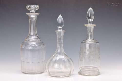 three glass carafes