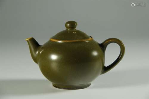 An old tea dust glazed tea pot