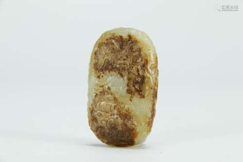 An archaic Russet jade carved pendant