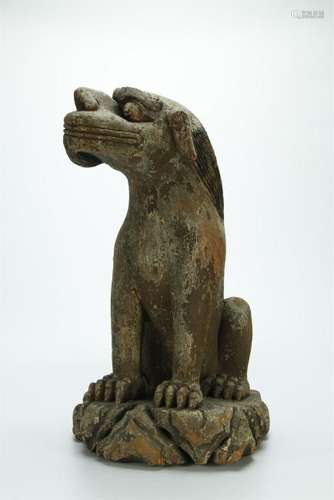 A rare hardwood carved beast figure, Yuan or Ming