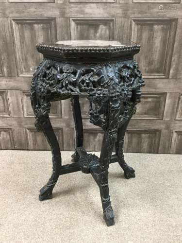 A 20TH CENTURY CHINESE HARDWOOD JARDINIERE STAND