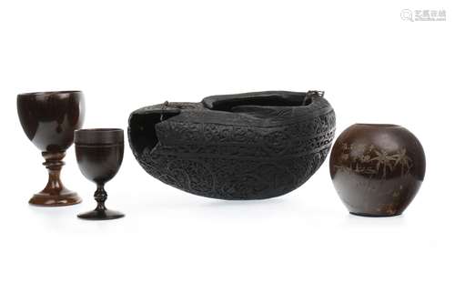 AN ISLAMIC EBONISED WOOD BEGGING BOWL AND OTHER ITEMS