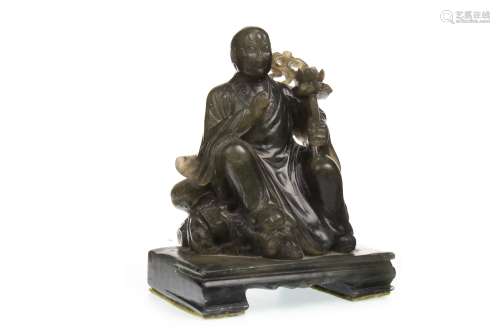 AN EARLY 20TH CENTURY CHINESE GREEN JADE BUDDHA