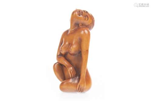 A 20TH CENTURY JAPANESE NETSUKE