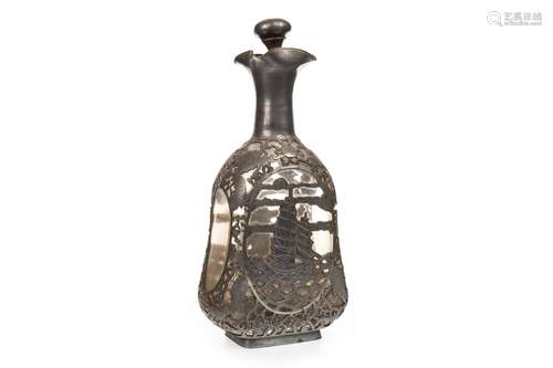 A 20TH CENTURY PEWTER OVERLAID GLASS DECANTER